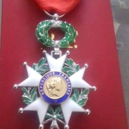 The Ordre national de la LÃ©gion dhonneur medal.