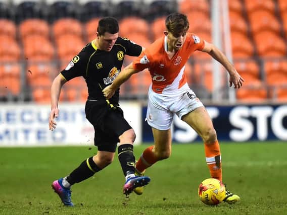 Cooke in action for Crewe against Blackpool last season