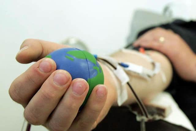 A person giving blood (Pic: Cathal McNaughton/PA Wire)
