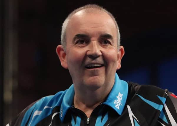 Phil Taylor meets Michael Van Gerwen in the quarter-finals     Picture: Lawrence Lustig/PDC