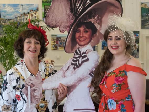 Coun Henshaw (left) is pictured with Zara Harris and the cutout of Audrey Hepburn