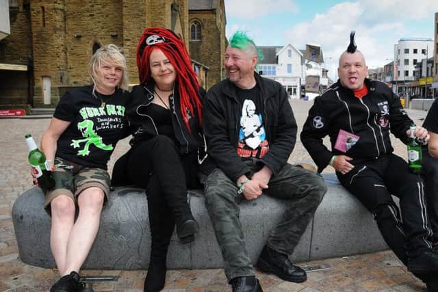 Punks relax in St Johns Square