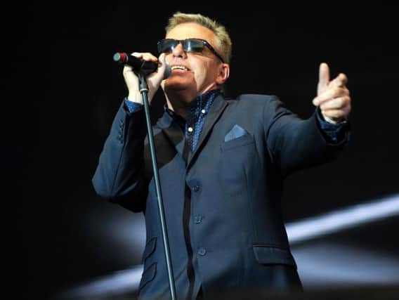 Suggs controls the crowd at Lytham Festival
