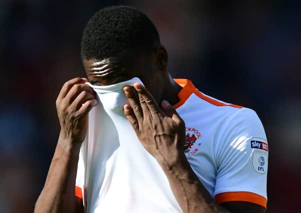 Bright Osayi-Samuel shows his disappointment at Blackpool's defeat