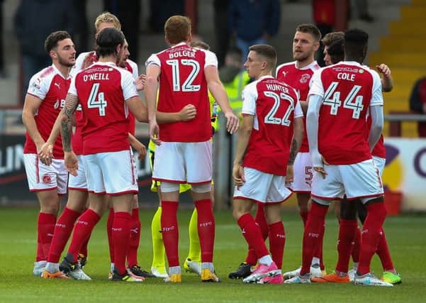 Fleetwood Town players huddle pre-match
