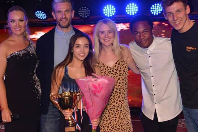 Northern Star winner Kaya Palmer, front, with from left, host Eden Kippax, with celebrity judges EastEnders and Hollyoaks star Glen Wallace, E4s Stage School star and Dreamgirls cast member Durone Stokes and West End performer Charlotte Jeffery, and contest organiser Ashley Luke Lloyd