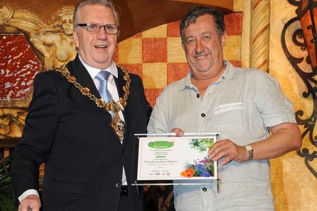 The Blackpool in Bloom Awards were presented during a ceremony in the Winter Gardens' Spanish Hall.
The Mayor of Blackpool Councillor Ian Coleman presents the award for Hotel with more than 10 rooms to Adrian Smirthwaite of  the Albany Hotel.  PIC BY ROB LOCK
9-8-2017