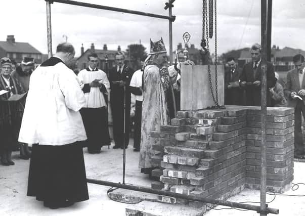 The Vicar of Fleetwood, the Reverend Jon McClintock (left) looks on as the Bishop of Blackburn lays the foundation stone of St. Nicholas Church in 1960