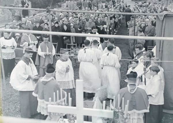 Parishoners watch the ceremony as the Roman Catholic Bishop of Lancaster Dr T E Flynn, laid and blessed the foundation stone of St Wulstan's Catholic Church, Poulton Road, Fleetwood in 1960