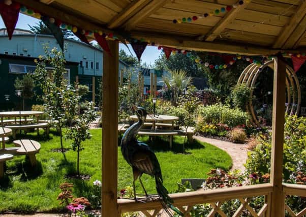 Blackpool Zoos live-in assistant head keeper Johnpaul Houston's garden 
was transformed by Alan Titchmarsh and the Love Your Garden team