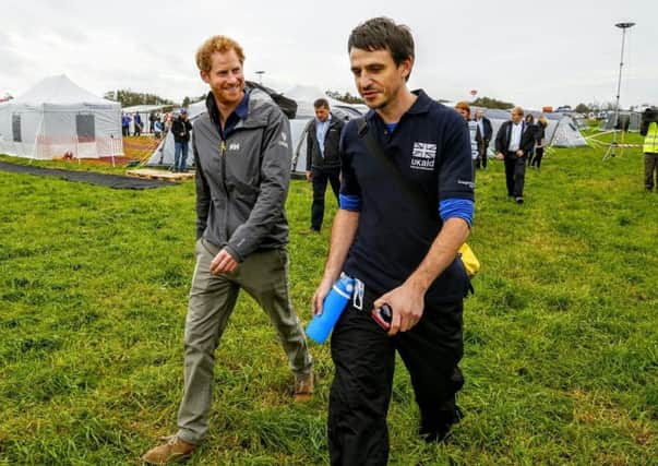 Aid worker Matt Benson, from Blackpool, with Prince Harry