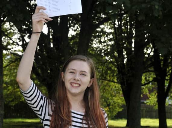 Eleanor MacMillan , who achieved an A a B  and a C at Carr Hill Sixth Form