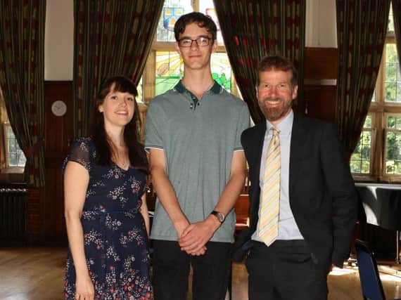 James Smith with outgoing Head of Physics Mark Gaddes with incoming Head of Physics Carol Courtney at Kirkham Grammar