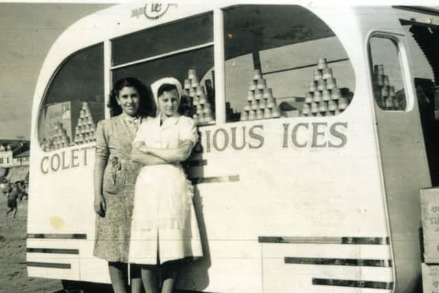 Maria Coletta (left) at one of the Ice Cream carts on Blackpool Beach 
1950s ? / Coletta's Ice Cream