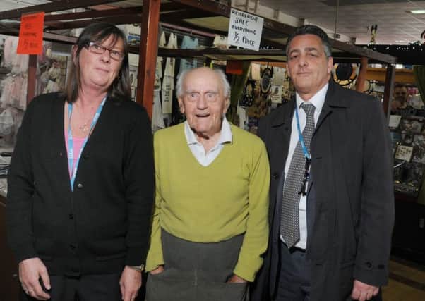 FLEETWOOD 18-08-17
Arthur Ellis,96, is retiring from his stall at Fleetwood Indoor Market, after 55 years, pictured with another stall holder Allison Hume, left, and market manager Julian Brent, right.