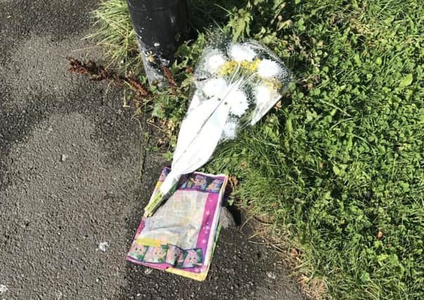 A floral tribute left in Shiney Row.