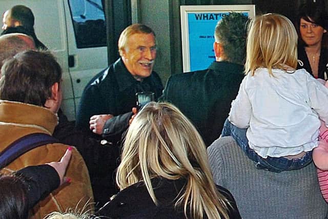 Sir Bruce Forsyth visits fans waiting in a queue  for Strictly Come Dancing outside Blackpool Tower