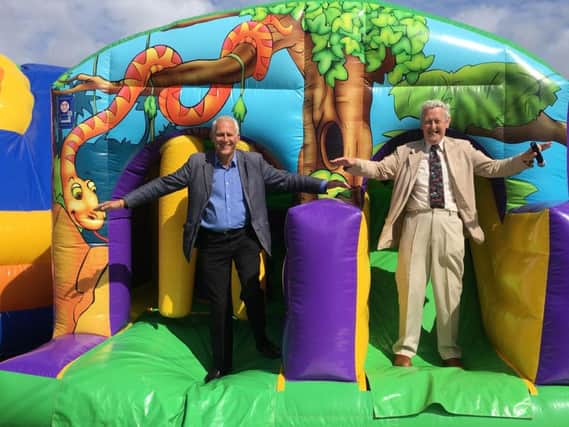 Blackpool South MP Gordon Marsden and Coun Peter Hunter having fun at the Lostock Community Centre event
