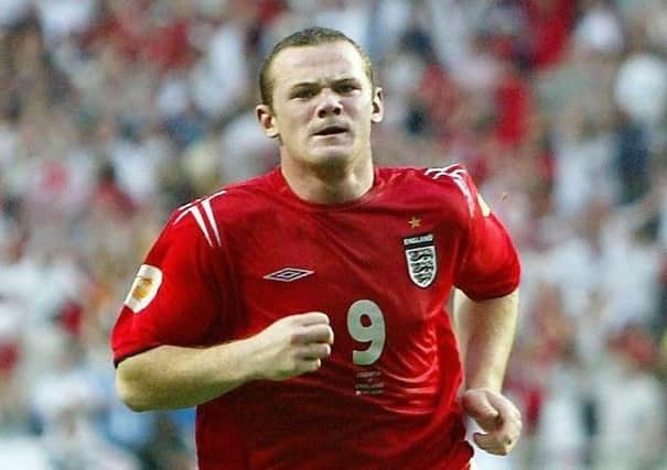 Wayne Rooney celebrates scoring the second goal against Croatia during Euro 2004