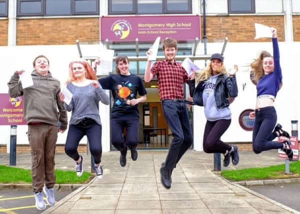 Montgomery pupils celebrate getting their GCSE results.
Pic by Dan Martino