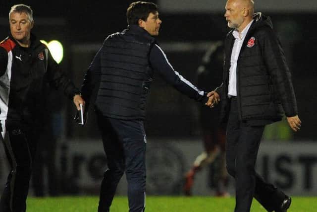 Bristol Rovers boss Darrell Clarke and Fleetwood Town head coach Uwe Rosler shake hands after Bristol's 2-1 win at the Memorial Stadium last November.