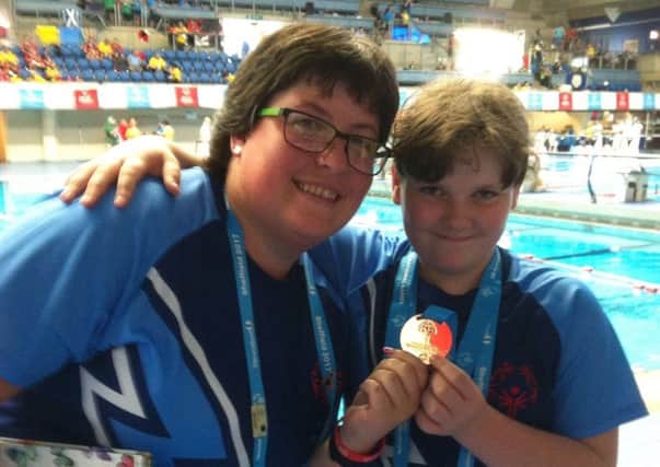 Coach Emma Inglis with golden girl Chloe Crook at the National Games 2017
