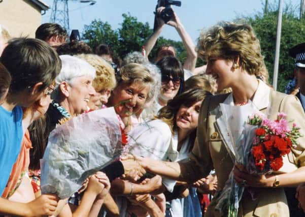 Princess Diana among the crowds outside trinity hospice, in 1992