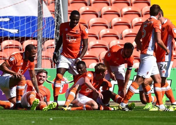 Blackpool celebrate Sean Longstaff's goal