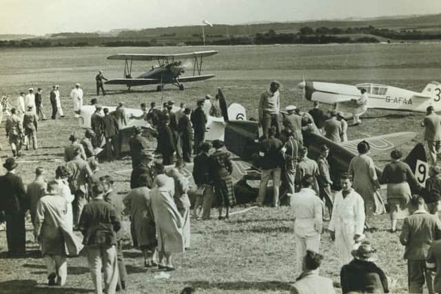 A scene at Stanley Park Airport in the 1930s, when competing machines in the King's Cup Air Race were landing to check in and refuel, Blackpool being one of the control points of the race