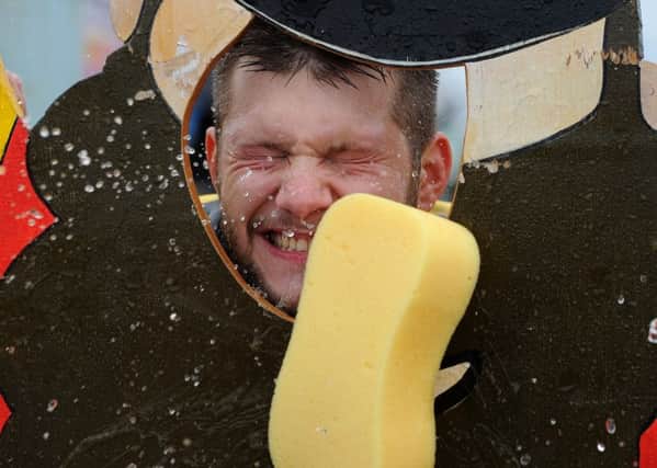 Peter Lilleyman gets a soaking in the stocks