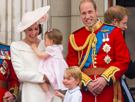 Duke and Duchess of Cambridge with Princess Charlotte and Prince George on the balcony of Buckingham Palace