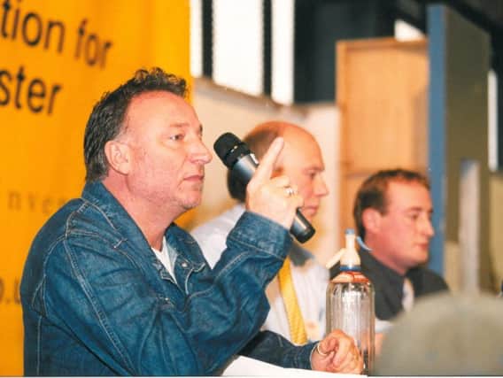 Joy Division and New Order bass player Peter Hook taking part in the auction of items from the legendary nightclub Hacienda