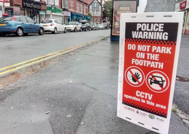 Signs on St Albans Road, St Annes, asking motorists to have regard for pedestrians