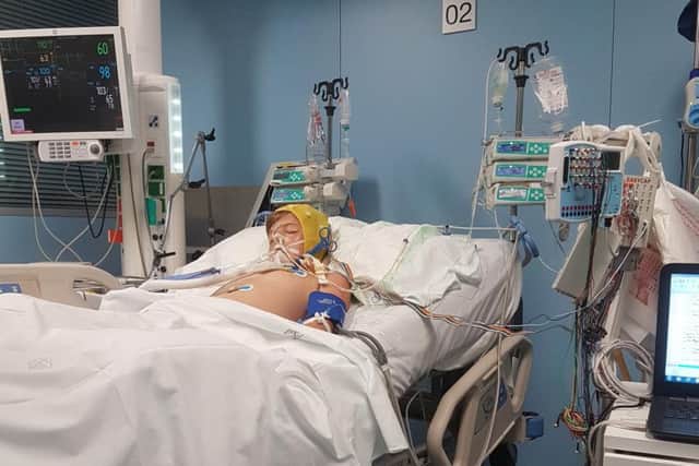 Young David Legge in hospital in Barcelona