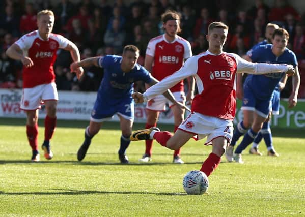 Fleetwood Town's Ashley Hunter scores his side's second goal from the penalty spot in the last minute of the match