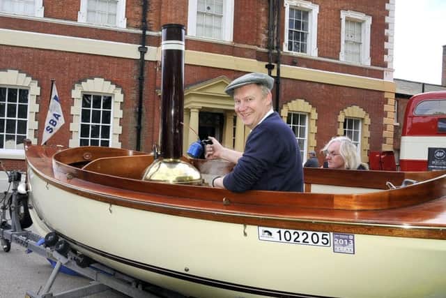 Steve Williams from St. Annes in a Replica Edwardian Steam Boat at Lytham Hall Steam Fair