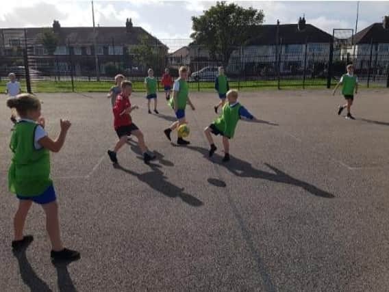 Children taking part in a sports programme at school delivered by Fleetwood Town Community Trust.