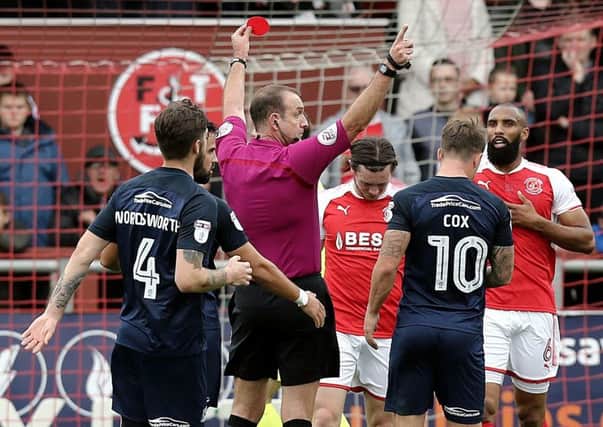 Aiden O'Neill is shown the red card