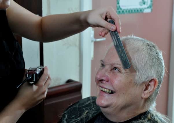 Photo Neil Cross
Brenda Naughton having her head shaved at Croft Court, Freckleton, to raise money for Macmillan