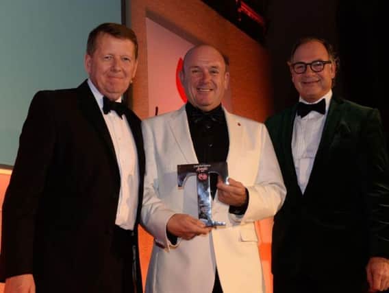 Leye D Johns picking up his Tourism Superstar award at the 2016 Lancashire Tourism Awards