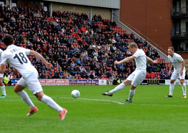 Danny Rowe scores Fylde's first at Leyton Orient Picture: STEVE MCLELLAN