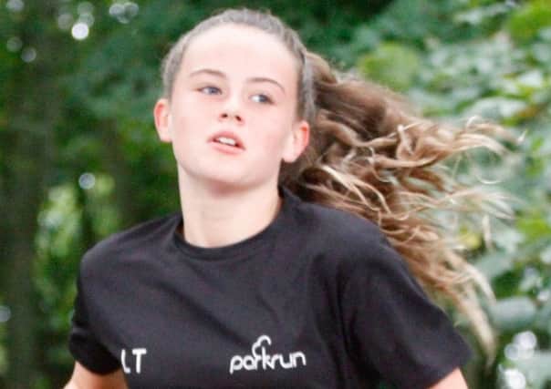 Lucy Tickle completes her centenary of parkruns