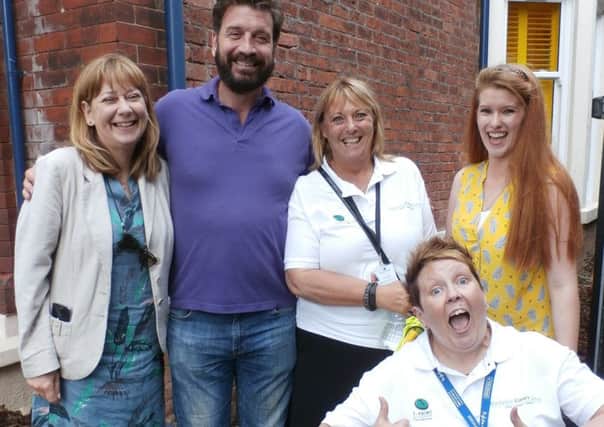 Nick Knowles from DIY SOS with the some of the Blackpool carers team after the Big Reveal