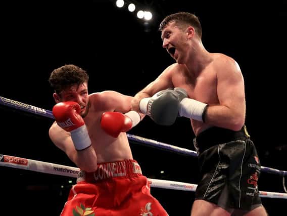 Cardle (right) on the attack at the Manchester Arena