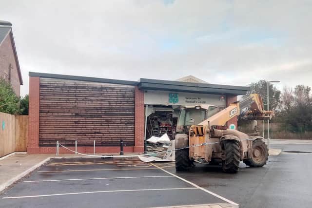 The thieves are believed to have used farming machinery to dig the cash machine out of the wall of theCoop convenience store on Sandy Lane.