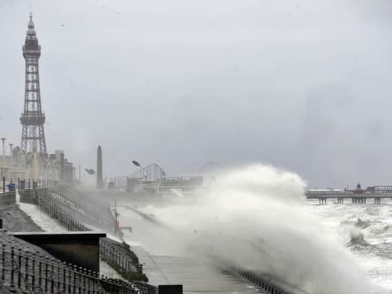 Waves crashing against Blackpool promenade