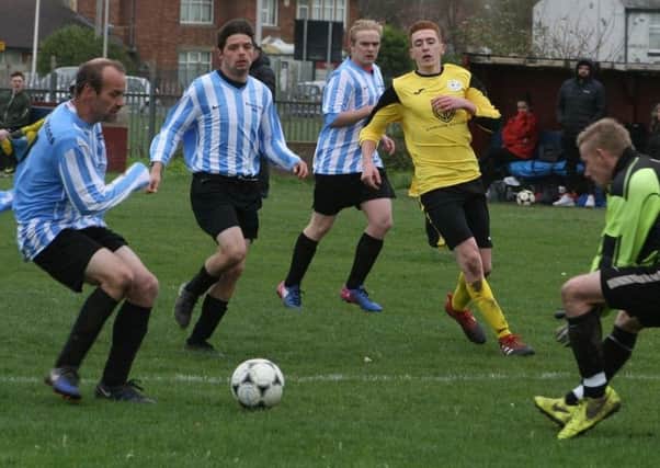 Action from the game between  McNaughtons and Clifton Rangers		                  Picture: Karen Tebbutt