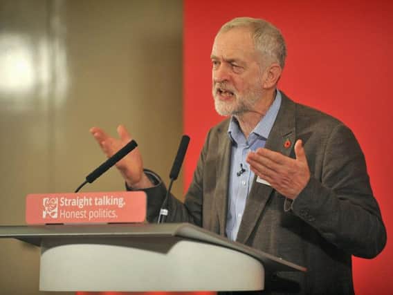 Jeremy Corbyn speaking at Labour's regional party conference in Blackpool in 2015
