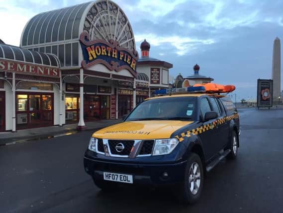 A man was discovered climbing metal posts under the North Pier in Blackpool tonight.