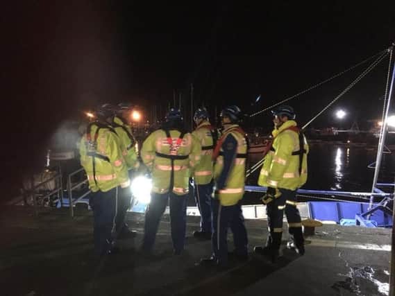 Rescuers at Fleetwood Dock last night (Picture: Fleetwood Coastguard)